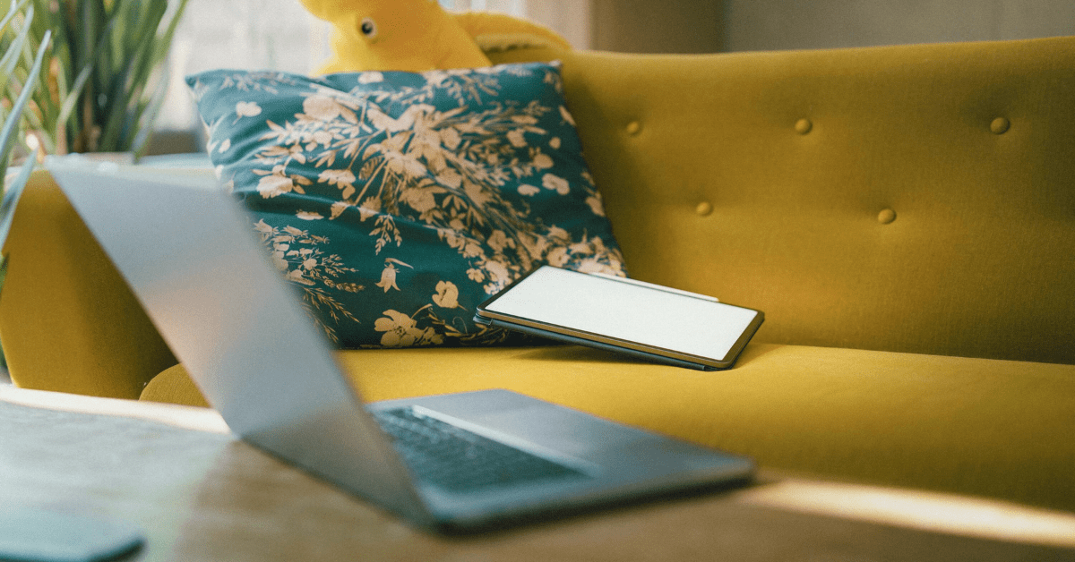 A calm, light-filled workspace with a laptop, coffee, and plants — a visual representation of soulful web design that feels grounded and welcoming.